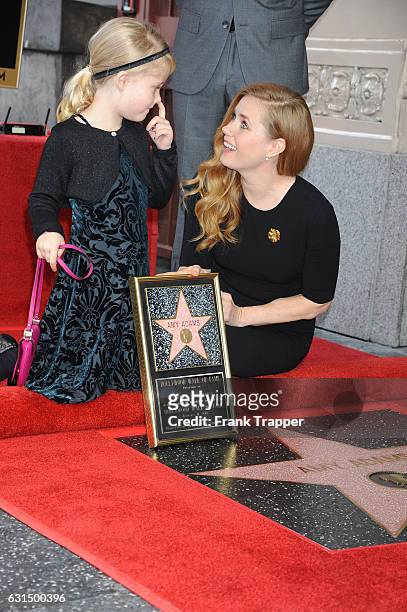 Actress Amy Adams and daughter Aviana Olea Le Gallo attend star ceremony on the Hollywood Walk of Fame on January 11, 2017 in Hollywood, California.