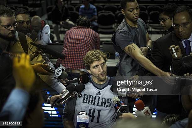 Dirk Nowitzki of Dallas talks with media after the Dallas Mavericks training session at Arena Ciudad de Mexico on January 11, 2017 in Mexico City,...