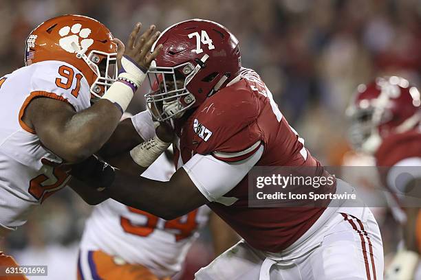 Alabama Crimson Tide offensive lineman Cam Robinson blocks Clemson Tigers defensive end Austin Bryant during the 2017 College Football National...