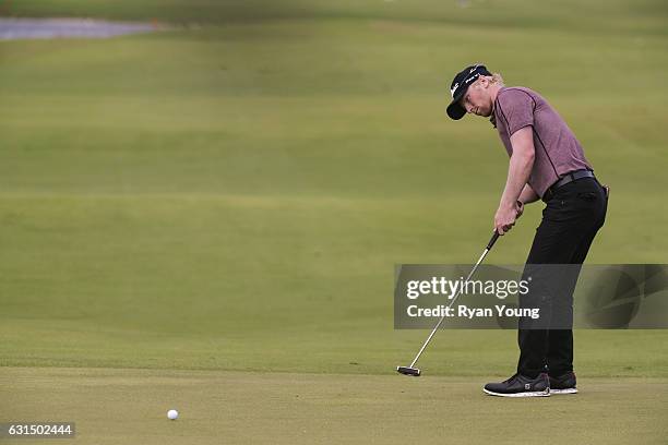 Anders Albertson putts on the 18th hole during the final round of The Bahamas Great Exuma Classic at Sandals - Emerald Bay Course on January 11, 2017...