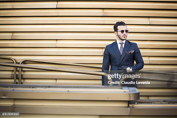 Umit Obeyd, with nyc serhat suit, is seen on January 11, 2017 in Florence, Italy.