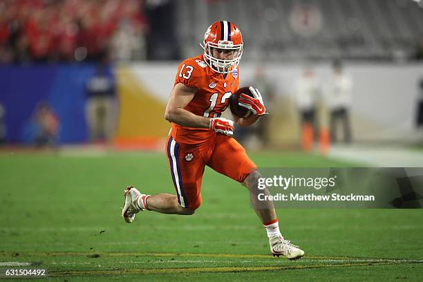 Hunter Renfrow of the Clemson Tigers runs with the ball against the Ohio State Buckeyes during the 2016 PlayStation Fiesta Bowl at University of...