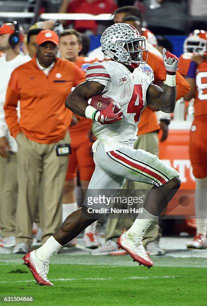 Curtis Samuel of the Ohio State Buckeyes runs with the ball against the Clemson Tigers during the 2016 PlayStation Fiesta Bowl at University of...
