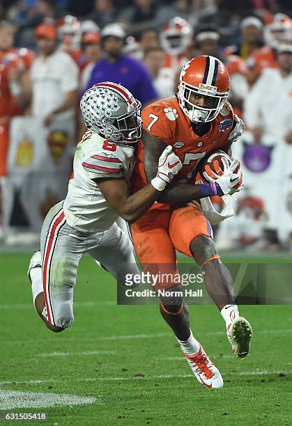 Mike Williams of the Clemson Tigers runs with the ball against Gareon Conley of the Ohio State Buckeyes during the 2016 PlayStation Fiesta Bowl at...