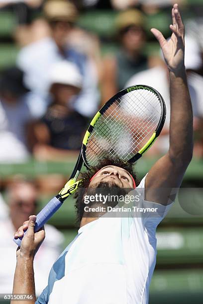 Jo-Wilfried Tsonga of France serves in his match against Borna Coric of Croatia during day three of the 2017 Priceline Pharmacy Classic at Kooyong on...