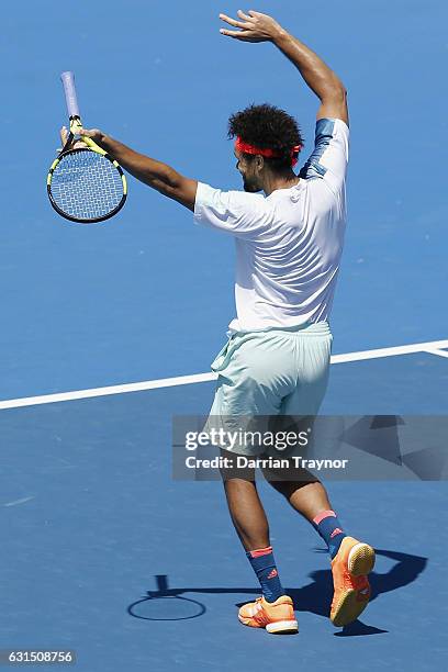 Jo-Wilfried Tsonga of France plays up to the crowd in his match against Borna Coric of Croatia during day three of the 2017 Priceline Pharmacy...