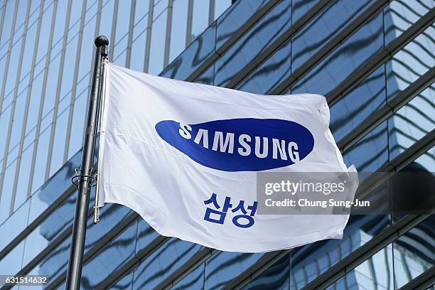 Samsung flag flies outside the company's headquarters on January 12, 2017 in Seoul, South Korea. The independent counsel team investigating the...