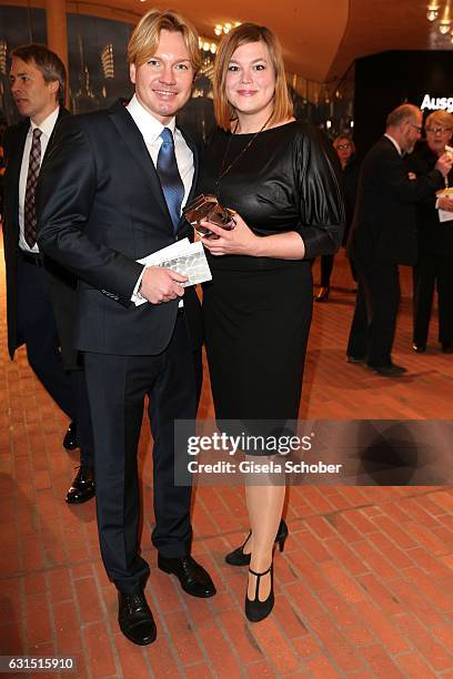 Katharina Fegebank and her boyfriend Mathias Wolff during the opening concert of the Elbphilharmonie concert hall on January 11, 2017 in Hamburg,...