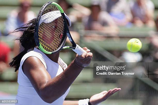 Destanee Aiava of Australia plays a forehand shot in her match against Qiang Wang of China during day three of the 2017 Priceline Pharmacy Classic at...