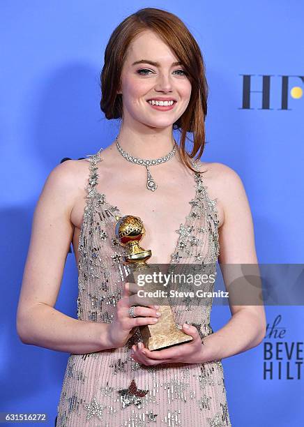 Emma Stone poses at the 74th Annual Golden Globe Awards at The Beverly Hilton Hotel on January 8, 2017 in Beverly Hills, California.