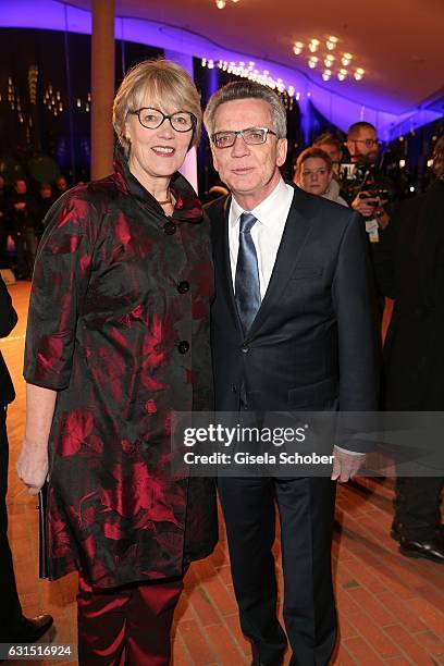 Interior Minister Thomas de Maiziere and his wife Martina de Maiziere during the opening concert of the Elbphilharmonie concert hall on January 11,...