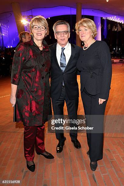 Interior Minister Thomas de Maiziere and his wife Martina de Maiziere and Monika Gruetters, minister for culture and media during the opening concert...