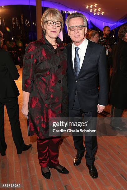 Interior Minister Thomas de Maiziere and his wife Martina de Maiziere during the opening concert of the Elbphilharmonie concert hall on January 11,...
