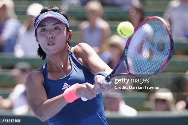 Qiang Wang of China plays a backhand shot in her match against Destanee Aiava of Australia during day three of the 2017 Priceline Pharmacy Classic at...