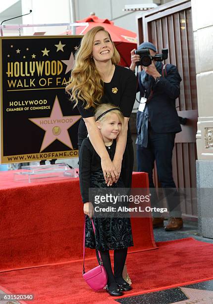 Actress Amy Adams with daughter Aviana Olea Le Gallo at her Star Ceremony held on The Hollywood Walk of Fame on January 11, 2017 in Hollywood,...