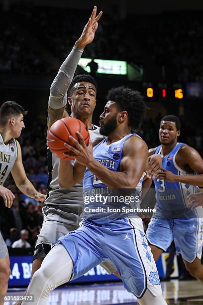 North Carolina Tar Heels guard Joel Berry II drives against Wake Forest Demon Deacons forward John Collins during the second half on January 11, 2017...