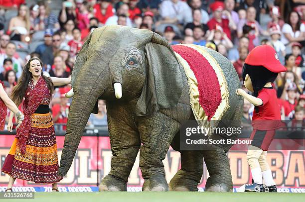 Bollywood dancers and a replica Elephant dance on the field during the Big Bash League match between the Melbourne Renegades and the Hobart...