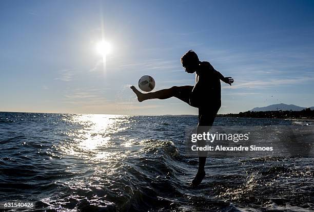 Felix Passlack of Borussia Dortmund plays football on the beach during a training camp on January 11, 2017 in Marbella, Spain.