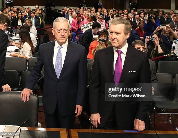 Defense Secretary nominee retired Marine Corps Gen. James Mattis stands with Former Defense Secretary William Cohen during his Senate Armed Services...