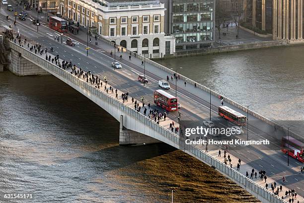 london bridge aerial with commuters - london bridge england fotografías e imágenes de stock