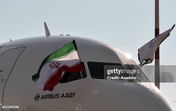 IranAir's passenger plane, Airbus A321, taken delivery of its first of 100 AirBus, lands at the Mehrabad International Airport, in Tehran, Iran on...