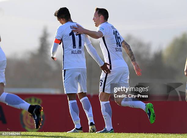 Sami Allagui and Julian Schieber of Hertha BSC celebrate during the test match between UD Poblense and Hertha BSC on January 12, 2017 in Palma de...