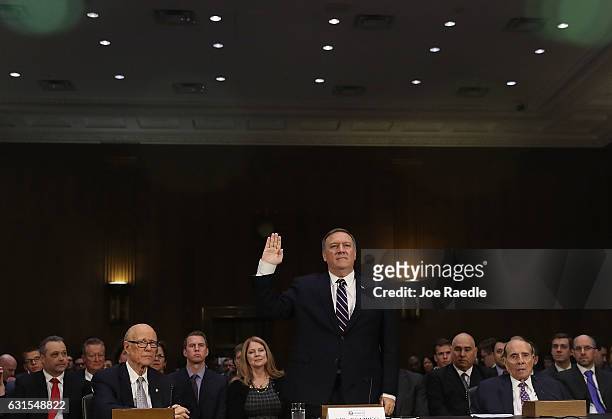 President-elect Donald Trump's nominee for the director of the CIA, Rep. Mike Pompeo is sworn in at his confirmation hearing before the Senate...