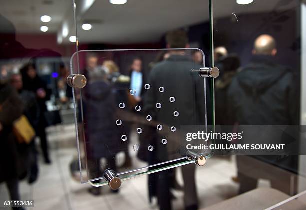 People wait at the reception of the emergency department of the hospital of Trousseau in Tours on January 12 during a major flu epidemic. French...