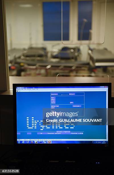 Computer is seen at the reception of the emergency department of the hospital of Trousseau in Tours on January 12 during a major flu epidemic. -...