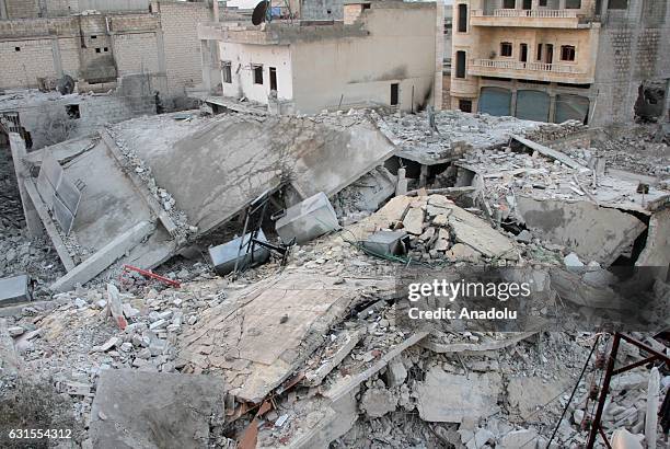 Debris of buildings are seen after a warcraft belonging to Syrian army hit Binnish town of Idlib in Syria on January 12, 2017.