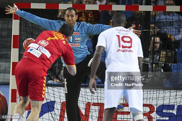 Missaoui Makrem 1, Lazarov Kiril and Sanai Mosbah 19 in action during the 25th IHF Men's World Championship 2017 Group B handball match Macedonia vs...