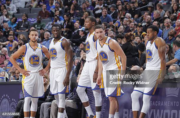 Stephen Curry, Draymond Green, Kevin Durant, Klay Thompson and Andre Iguodala of the Golden State Warriors face off against the Sacramento Kings on...