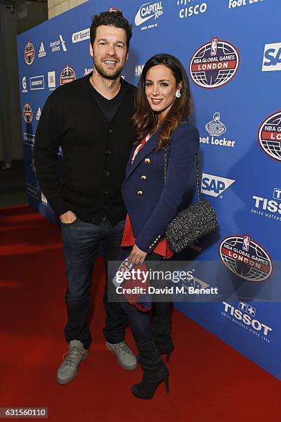 Michael Ballack and Natacha Tannous attend the Denver Nuggets v Indiana Pacers game during NBA Global Games London 2017 at The O2 Arena on January...