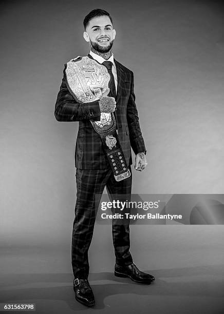 Portrait of UFC Bantamweight champion Cody Garbrandt posing with belt during photo shoot at Time Inc. Studios. New York, NY 1/12/2017 CREDIT: Taylor...