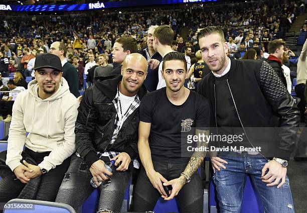 Kwesi Appiah, guest, Manuel Lanzini and Adrian sit courtside at the NBA Global Game London 2017 basketball game between the Indiana Pacers and Denver...