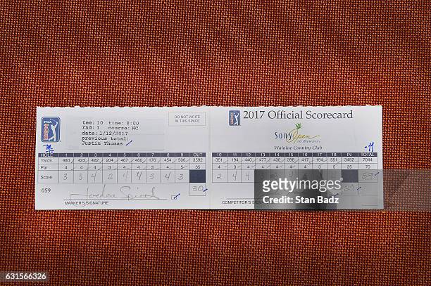 The official scorecard of Justin Thomas who scored a 59 is displayed after the first round of the Sony Open in Honolulu, Hawaii at Waialae Country...