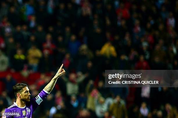 Real Madrid's defender Sergio Ramos celebrates after scoring a goal during the Spanish Copa del Rey round of 16 second leg football match Sevilla FC...