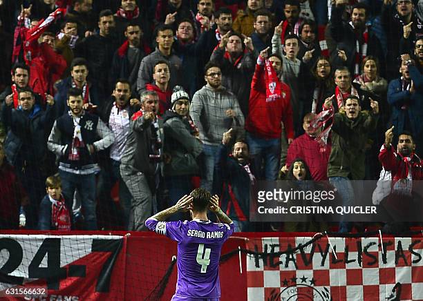 Real Madrid's defender Sergio Ramos celebrates after scoring a goal during the Spanish Copa del Rey round of 16 second leg football match Sevilla FC...