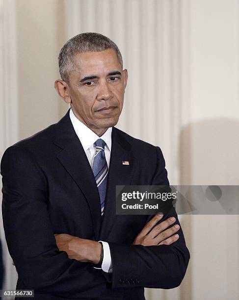 President Barack Obama before presenting Vice-President Joe Biden with the Medal of Freedom to him during an event in the State Dinning room of the...