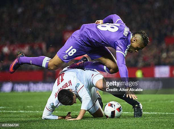 Mariano Diaz of Real Madrid CF competes for the ball with Matias Kranevitter of Sevilla FC during the Copa del Rey Round of 16 Second Leg match...
