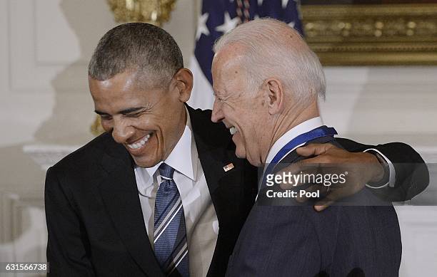 President Barack Obama presents the Medal of Freedom to Vice-President Joe Biden during an event in the State Dinning room of the White House,...
