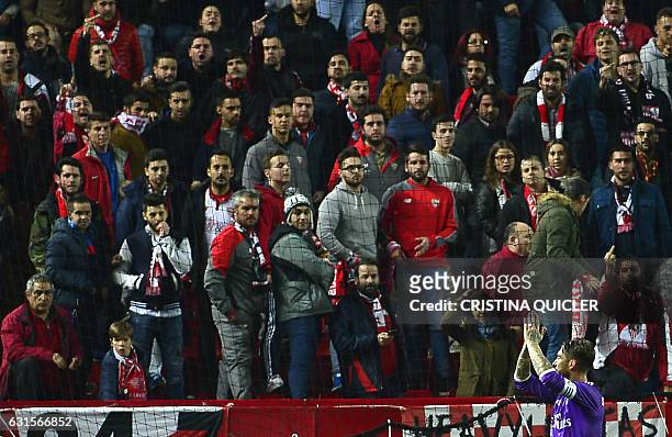 Real Madrid's defender Sergio Ramos celebrates after scoring during the Spanish Copa del Rey round of 16 second leg football match Sevilla FC vs Real...