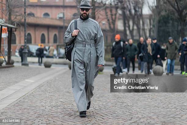 Raimondo Rossi is wearing a grey wool coat, grey hat on January 12, 2017 in Florence, Italy.