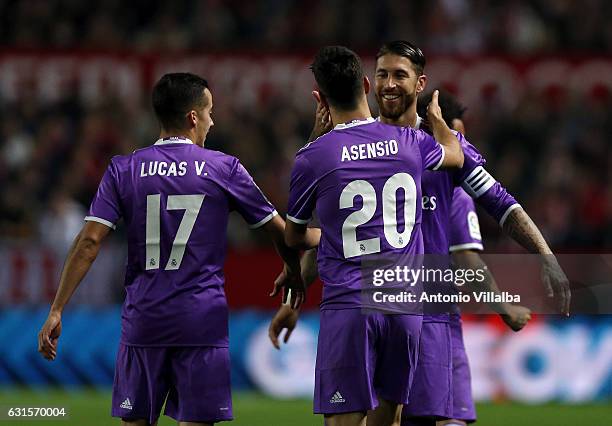 Marco Asensio of Real Madrid Celebrates his goal whit Sergio Ramos and Lucas Vazquez during the Copa del Rey round of 16 second leg match between...