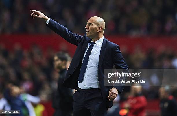 Head Coach of Real Madrid CF Zinedine Zidane gives instructions to his players during the Copa del Rey Round of 16 Second Leg match between Sevilla...