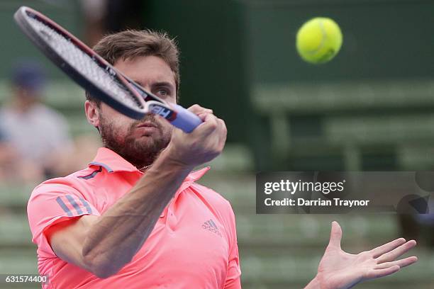 Gilles Simon of France plays a forehand shot in his match against Bernard Tomic of Australia during day four of the 2017 Priceline Pharmacy Classic...