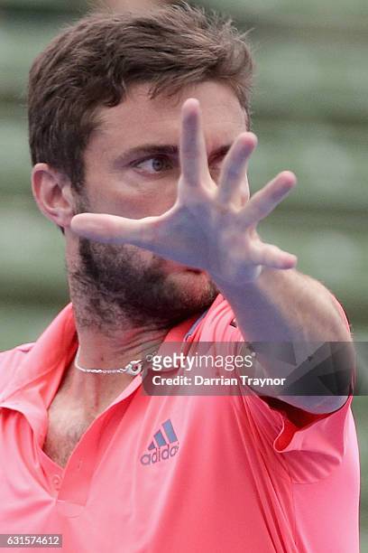 Gilles Simon of France plays a forehand shot in his match against Bernard Tomic of Australia during day four of the 2017 Priceline Pharmacy Classic...