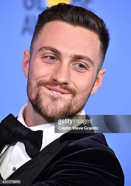 Aaron Taylor-Johnson poses at the 74th Annual Golden Globe Awards at The Beverly Hilton Hotel on January 8, 2017 in Beverly Hills, California.