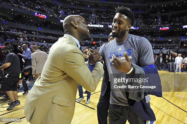 Wesley Matthews of the Dallas Mavericks talks to Former NBA player, Gary Payton before the game as part of NBA Global Games on January 12, 2017 in...