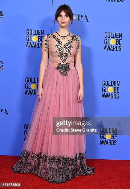 Felicity Jones poses at the 74th Annual Golden Globe Awards at The Beverly Hilton Hotel on January 8, 2017 in Beverly Hills, California.
